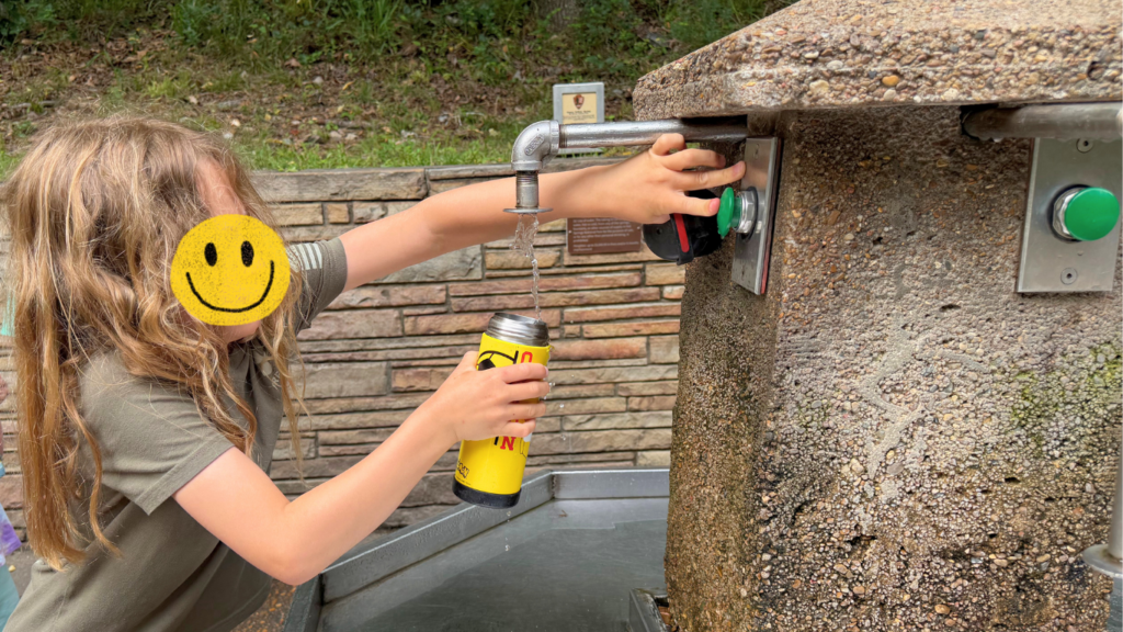 Cold water fountain at Hot Springs National Park with kids